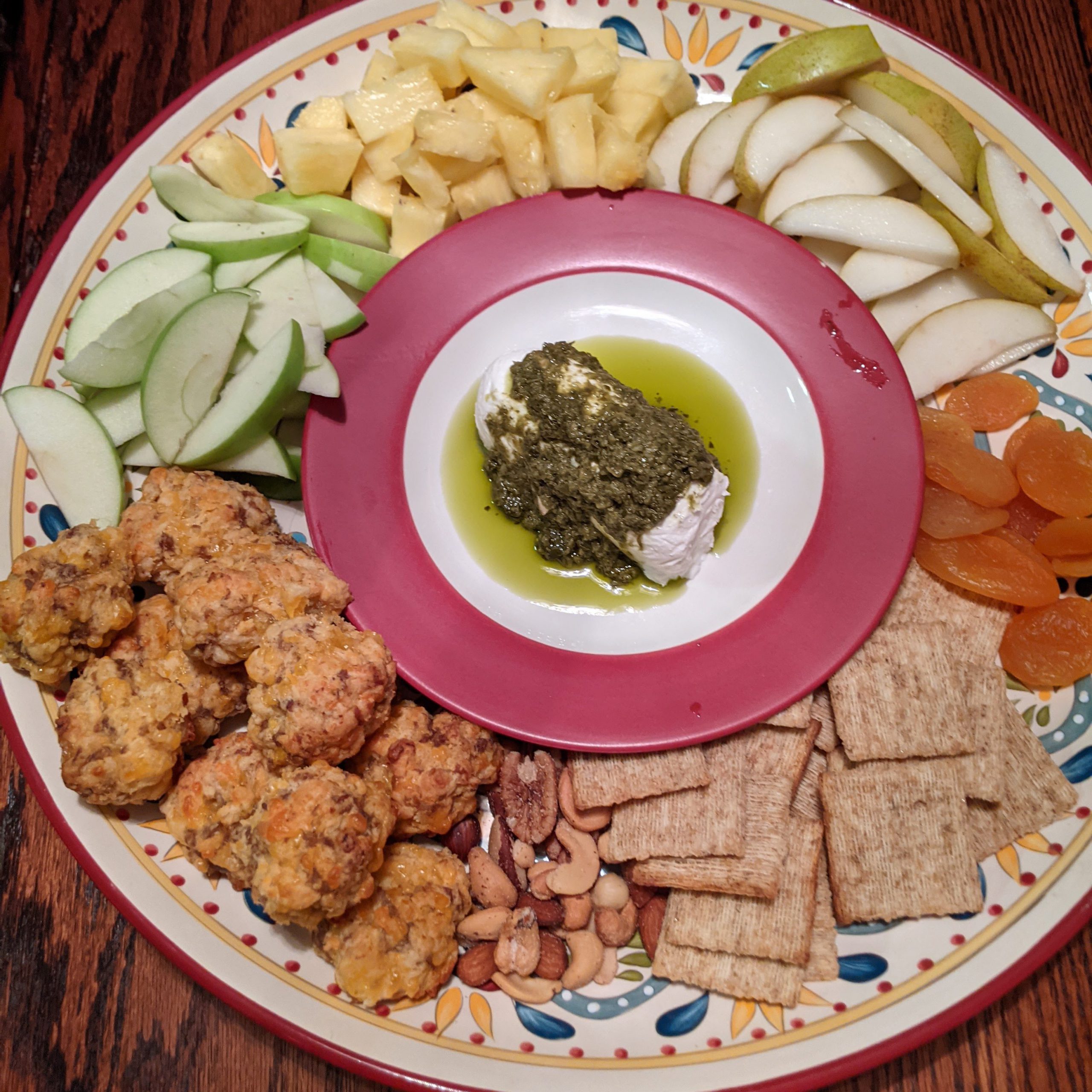 decorative plate with various foods arranged artfully on it